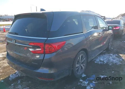 2021 Honda Odyssey Touring z USA, uszkodzony, nr VIN 5FNRL6H8XMB016662